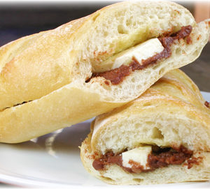 Baguette with refried beans and cheese